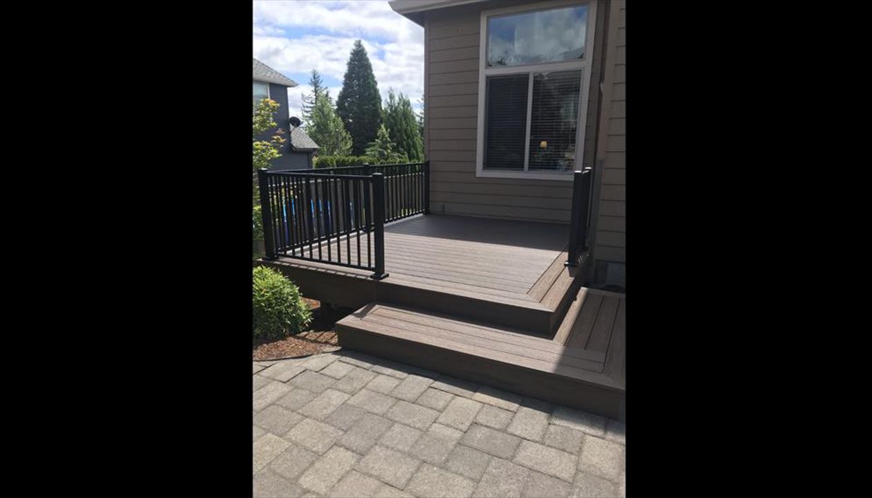 Spiced Rum deck with Trex Signature rails to complete this pristine backyard