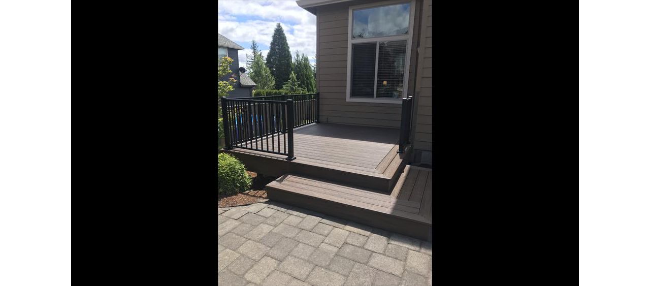 Spiced Rum deck with Trex Signature rails to complete this pristine backyard
