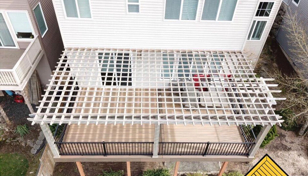 Trex Transcend Havana Gold Deck with Signature rail and cedar pergola.