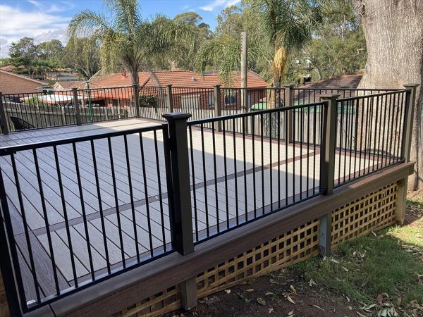 Trex gravel path felid with double lava rock boarder.