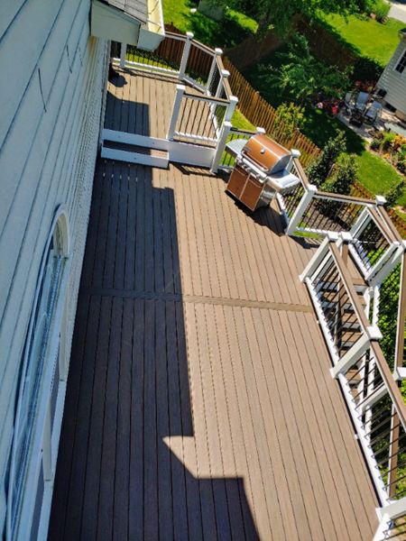 Trex Enhance Beach Dune Composite Deck with Trex Select Railing in Classic White white Round Aluminum Balusters in Charcoal Black