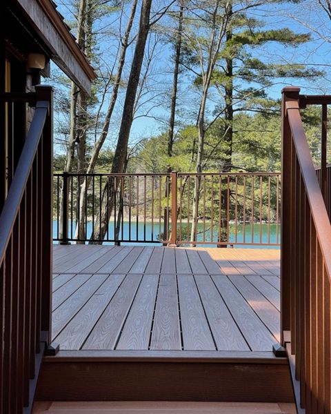 Relax and enjoy the views on your Trex Transcend Tiki Torch deck and Trex Signature Bronze Aluminum Railings! Don't you want a lake view like this?