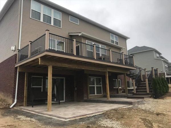 Trex Havana gold deck with rope swing fascia and post sleeves