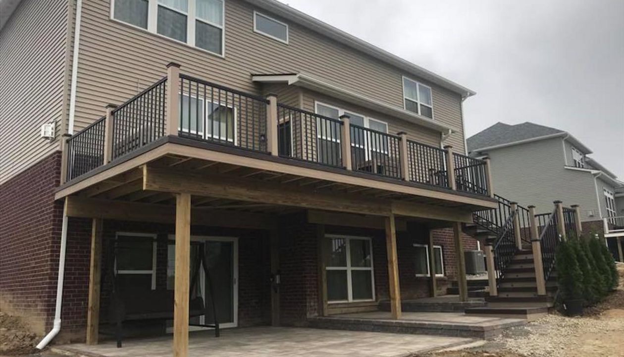 Trex Havana gold deck with rope swing fascia and post sleeves