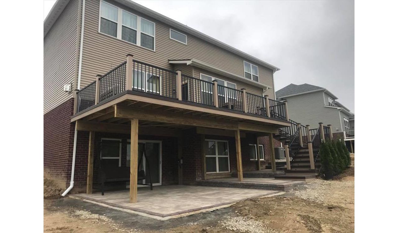 Trex Havana gold deck with rope swing fascia and post sleeves