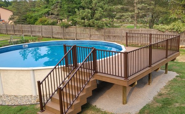 Trex Enhance Naturals Toasted Sand with Trex Signature Bronze railing. Ray Twp, Mi