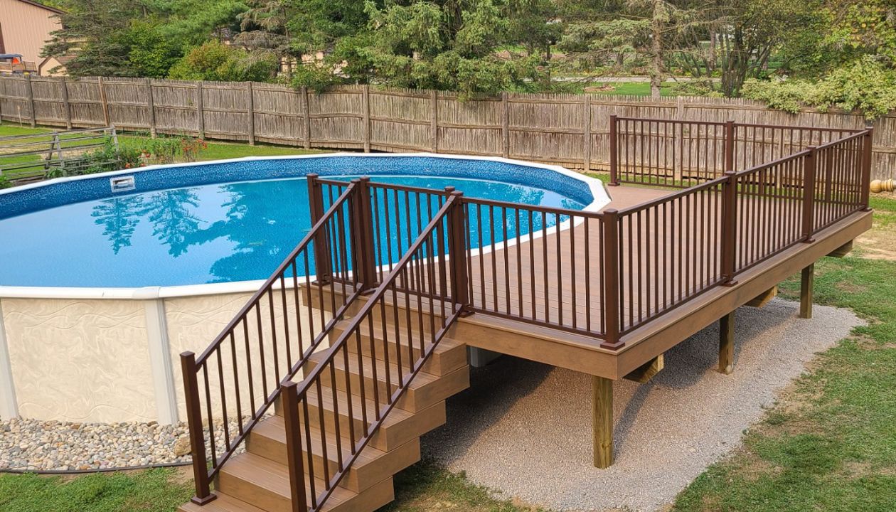 Trex Enhance Naturals Toasted Sand with Trex Signature Bronze railing. Ray Twp, Mi