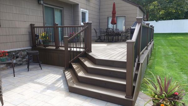 Dix hills trex spiced rum deck with  Cambridge patio