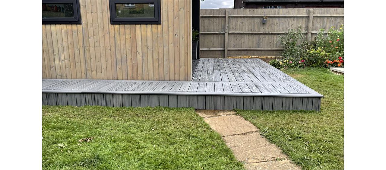 Just finished in little bought on Northampton, Love this rap around deck to the new out building built in trex transcend composite decking in the popular island mist colour just finishes it off lovely.
