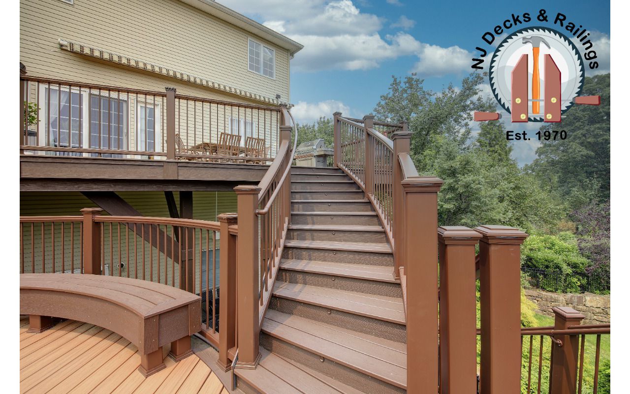 Custom Curved stairway leading to a round deck with curved benches.