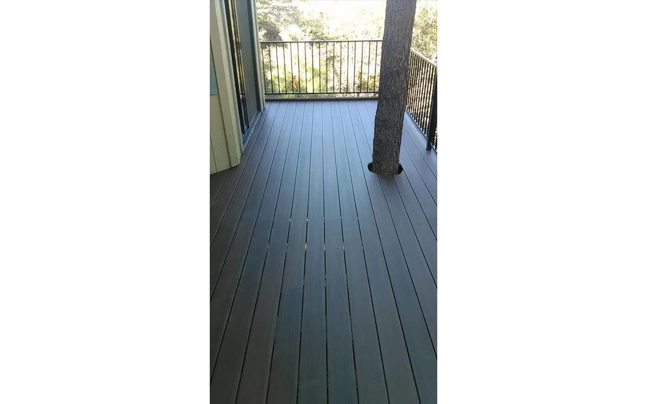 Prescott AZ. Lava Rock with groove, hidden clips. Trex joist tape.