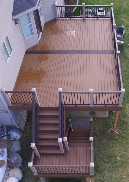 23x16 trex treehouse decking, vintage lantern trim, rainscape waterproofing, trex handrailing rope swing post sleeves with vintage lantern rails