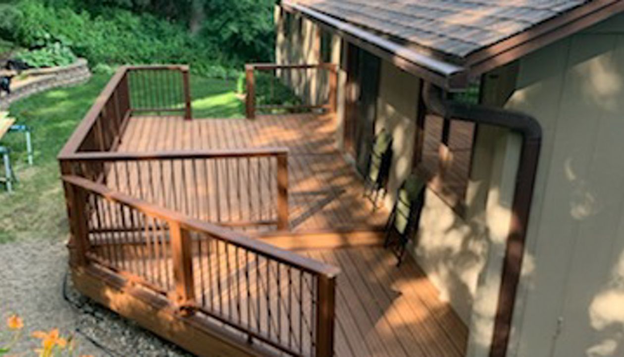 Tiki Torch with Spiced Rum Accent and Trex Trascend Railing