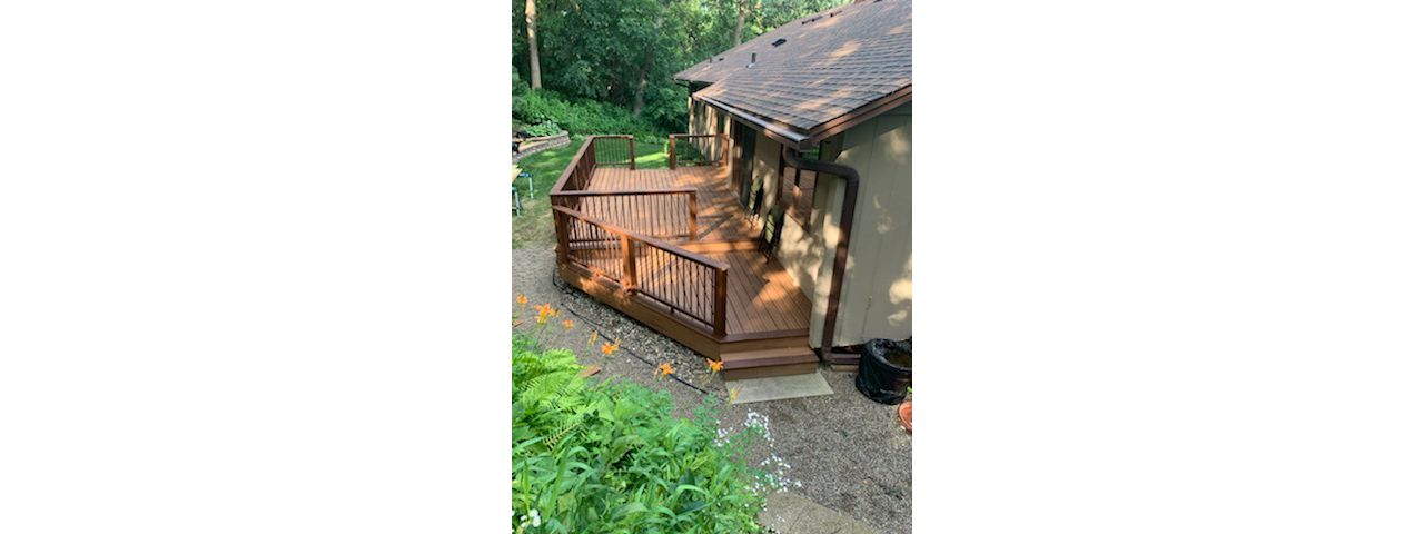 Tiki Torch with Spiced Rum Accent and Trex Trascend Railing