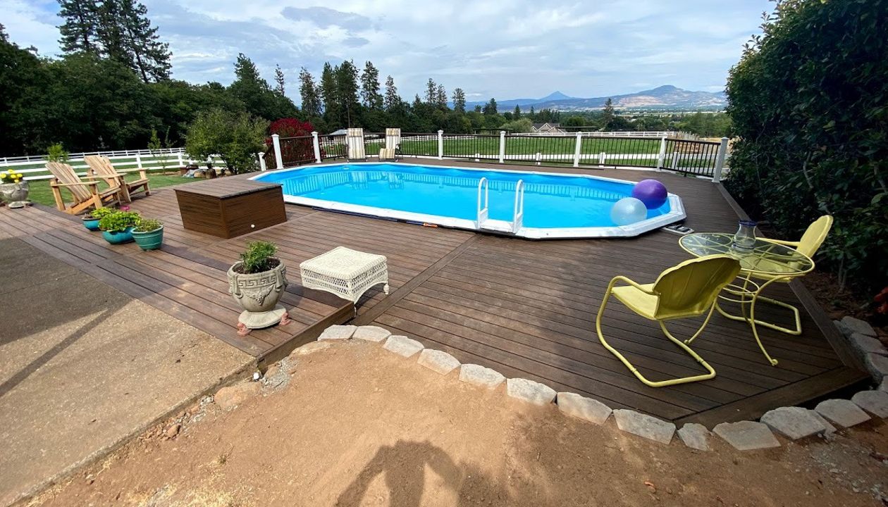 Extend pool deck around pool