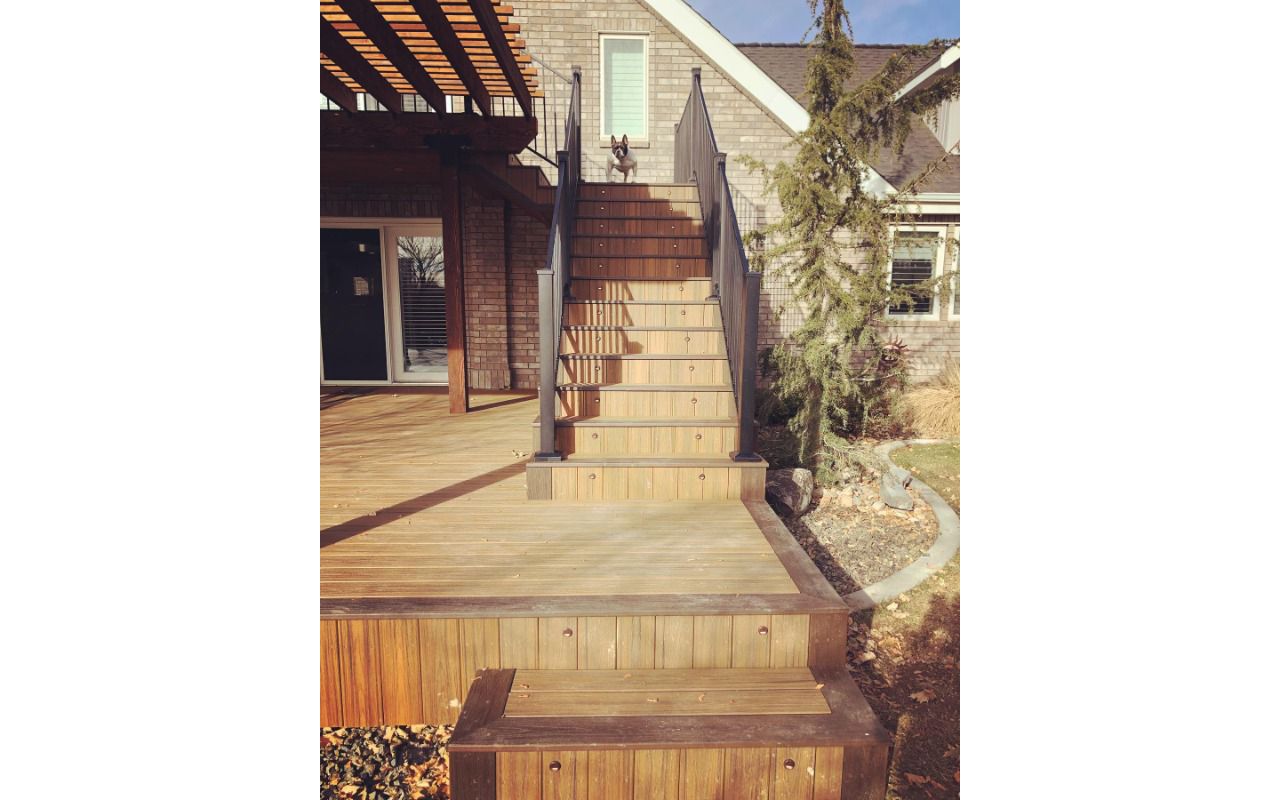Staircase done in Trex Havana Gold and trimmed with Spiced Rum, Trex lighting on each step