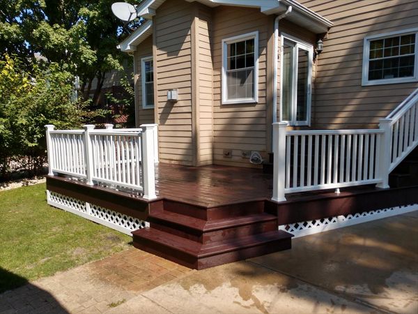 Woodland brown select, Transcend railings in classic white.
