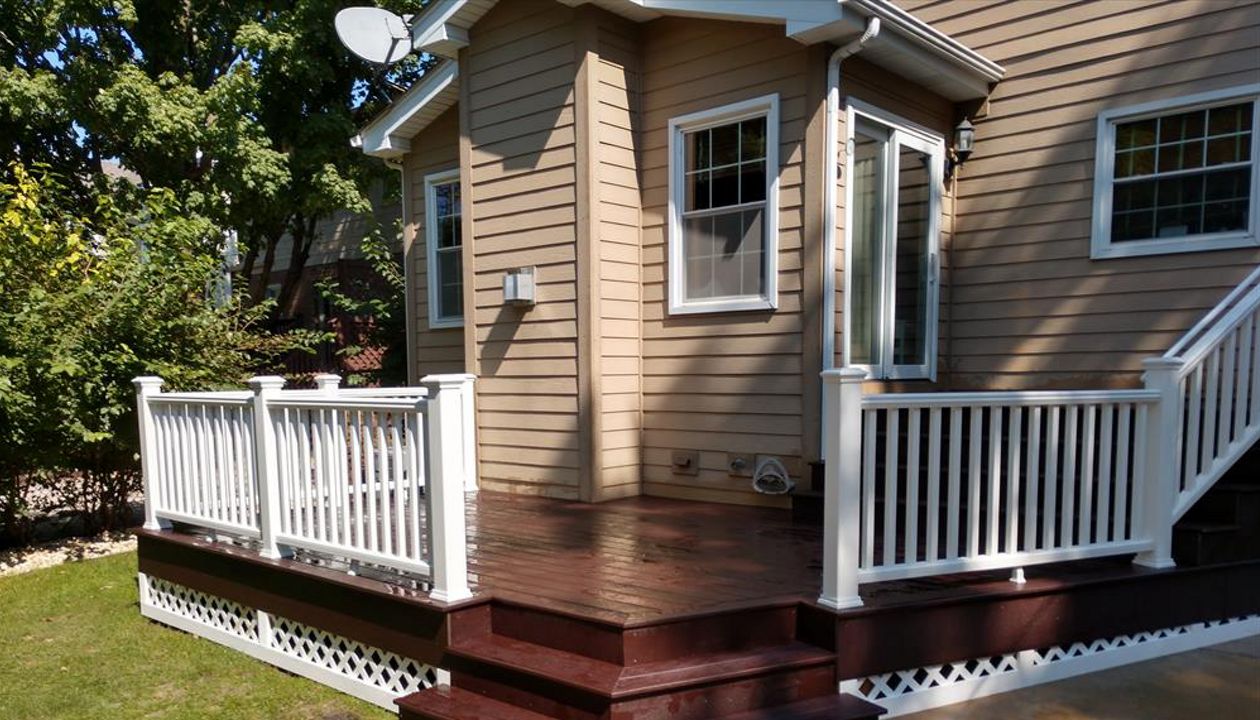 Woodland brown select, Transcend railings in classic white.