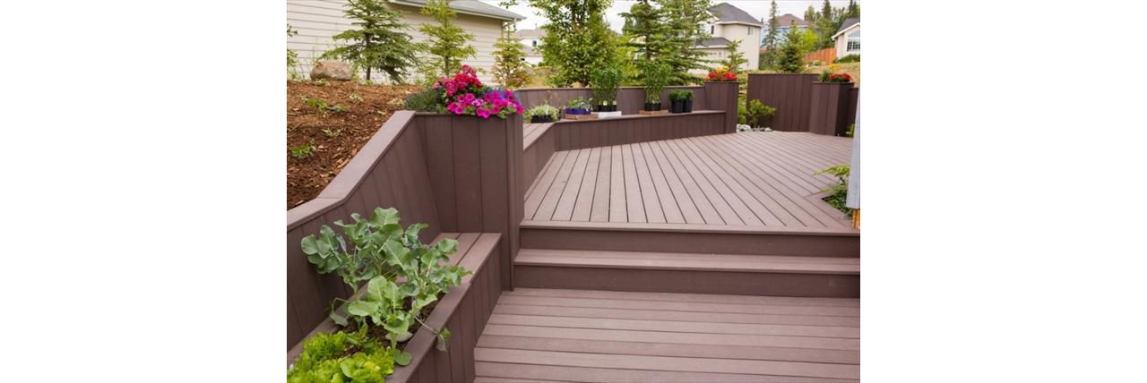 Alaskan built in Trex benches and flower boxes, Treeline