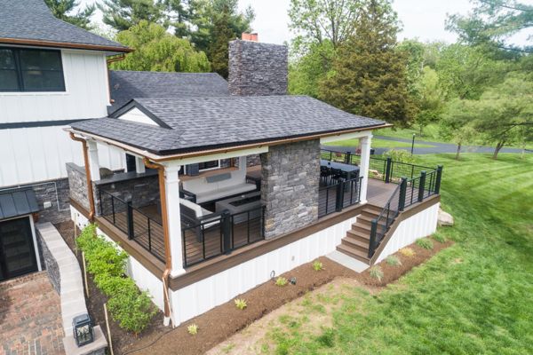 Trex Deck with Spiced Rum Decking, Trex Rod Rail, Custom Roof & Stonework
