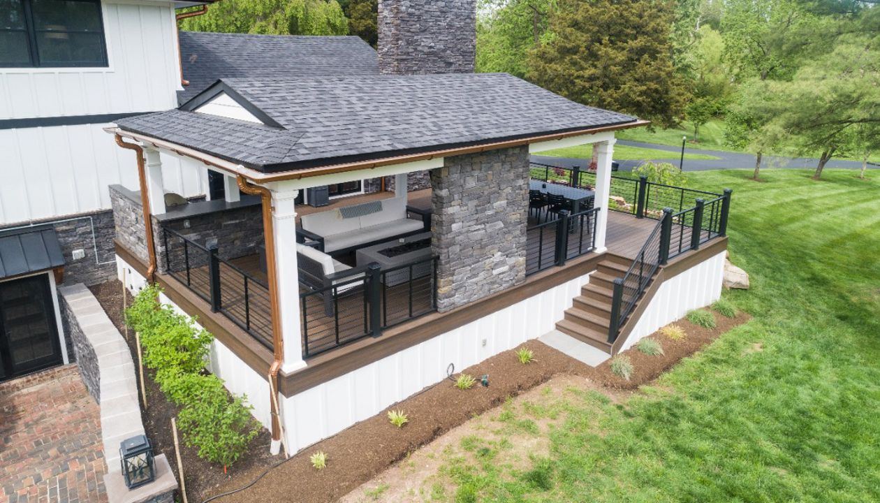 Trex Deck with Spiced Rum Decking, Trex Rod Rail, Custom Roof & Stonework