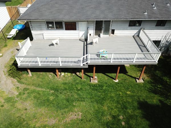 Trex Island Mist Decking with White Transcend Railing.