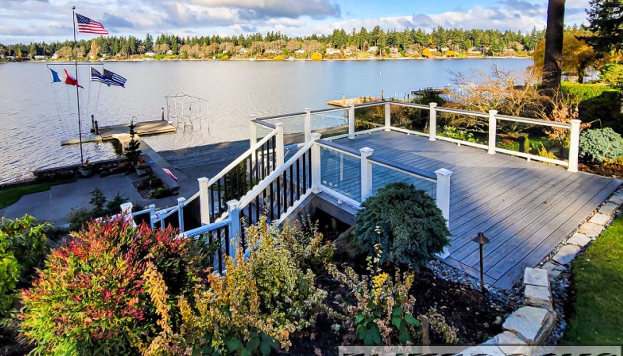 rex Island Mist Transcend with White Glass railing Deck