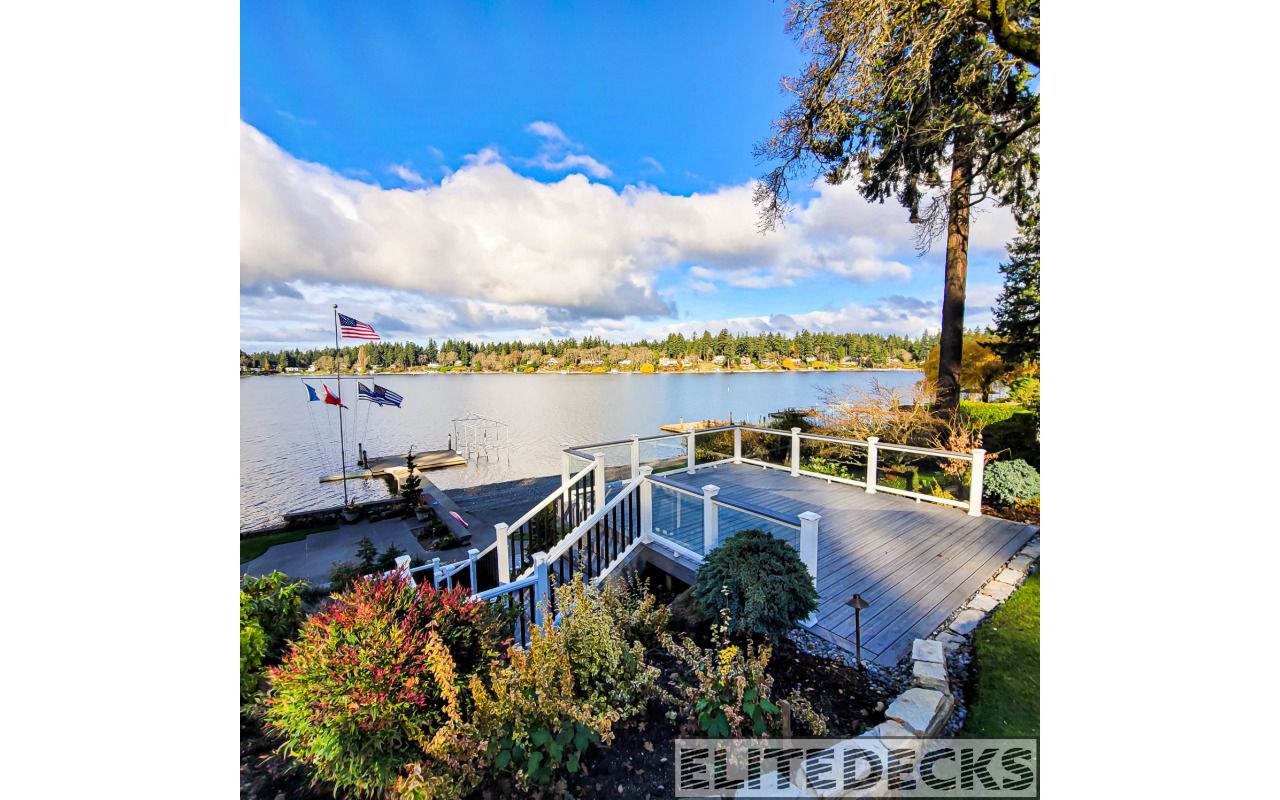 rex Island Mist Transcend with White Glass railing Deck