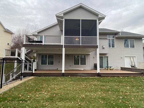 Trex Transcends Havana Gold Decking, Select Railings, Rain Escape Ceiling, 2 Level Deck, & A Lot Of Detail