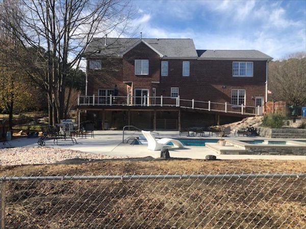 Trex Transcend Tiki Torch deck & Transcend white railing in Durham, NC.