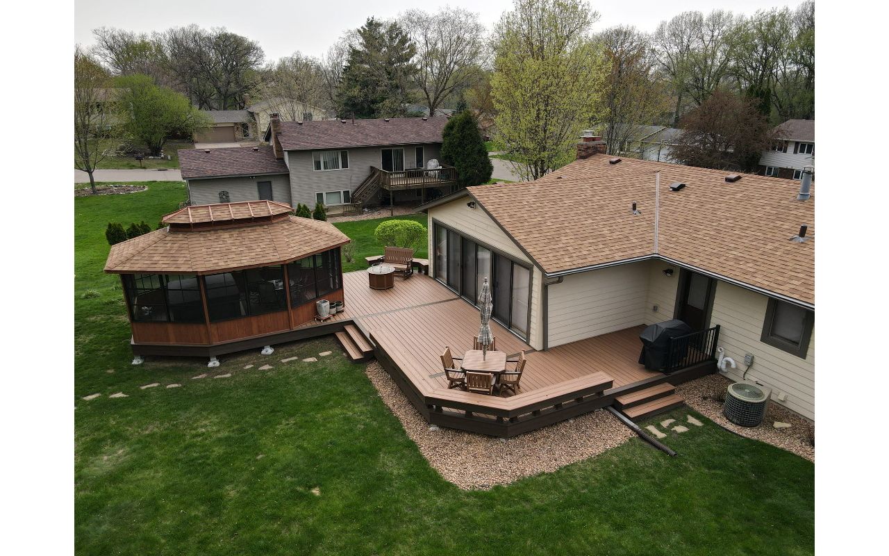 Trex deck with built in benches, gazebo, and Trex riser lights in Maplewood