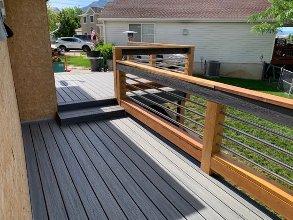 Trex Transcend Island Mist with custom built stainless steel/ redwood railing with Trex Transcend Drink Rail in Weber County, Ut