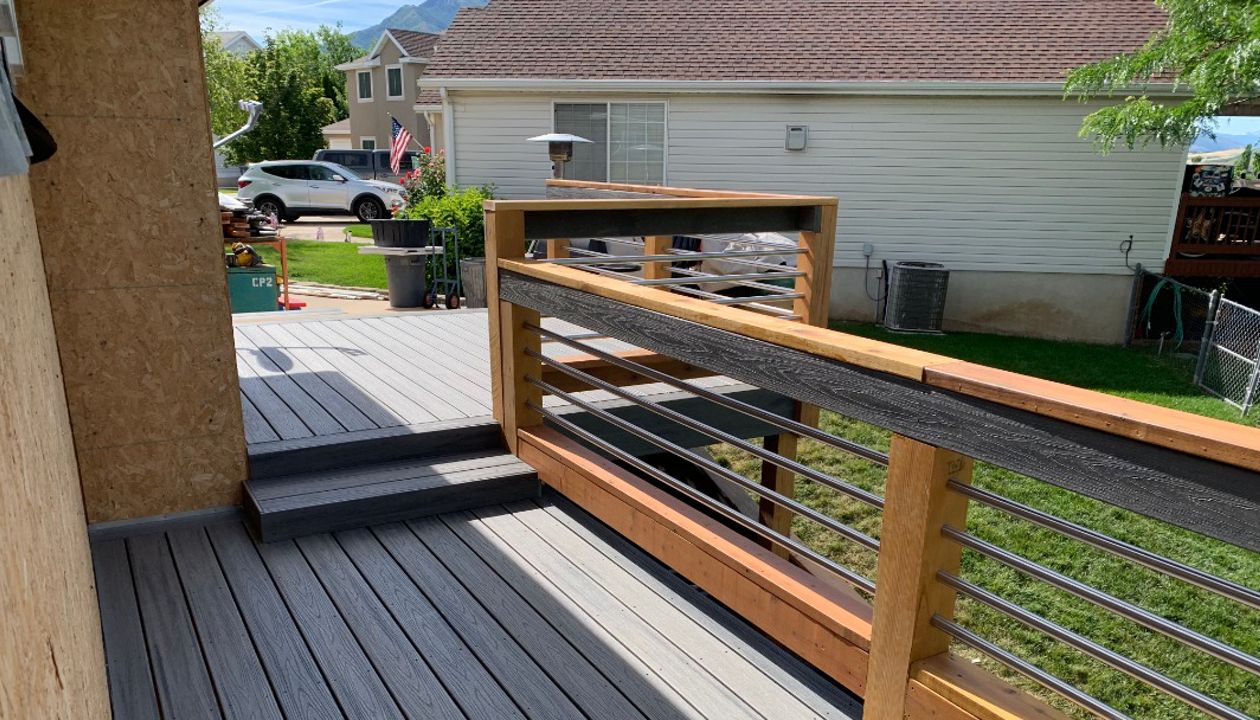 Trex Transcend Island Mist with custom built stainless steel/ redwood railing with Trex Transcend Drink Rail in Weber County, Ut