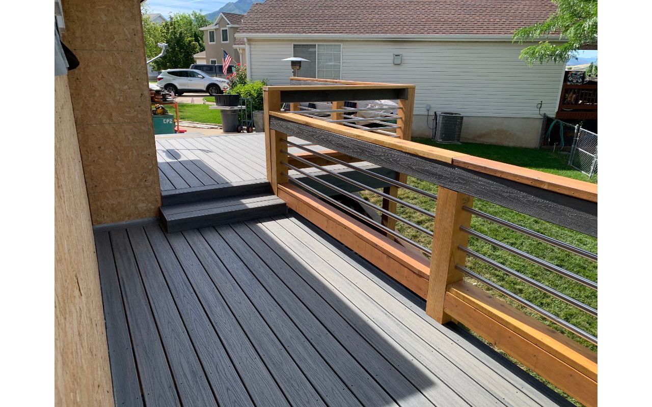Trex Transcend Island Mist with custom built stainless steel/ redwood railing with Trex Transcend Drink Rail in Weber County, Ut