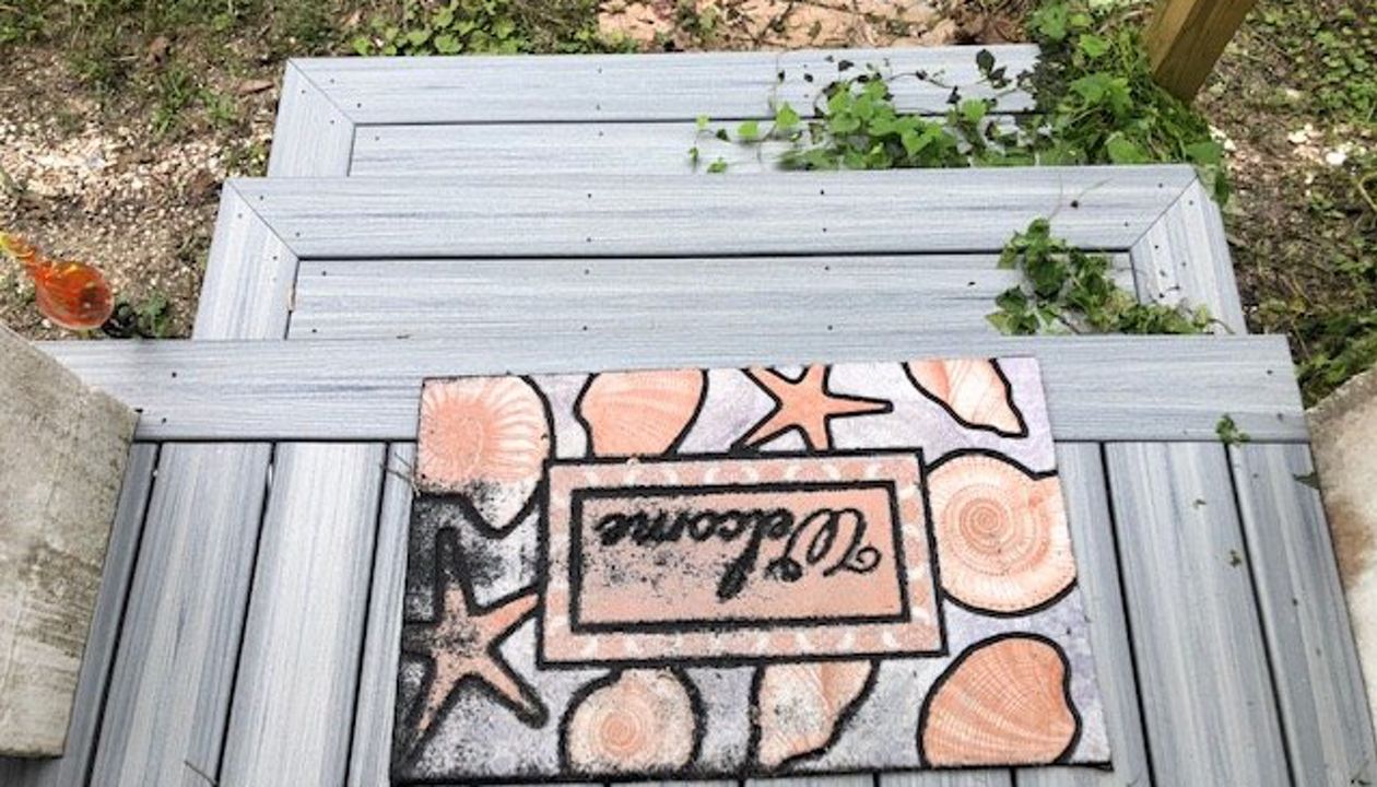 Trex Enhance Naturals Foggy Wharf stairs with a great picture frame design