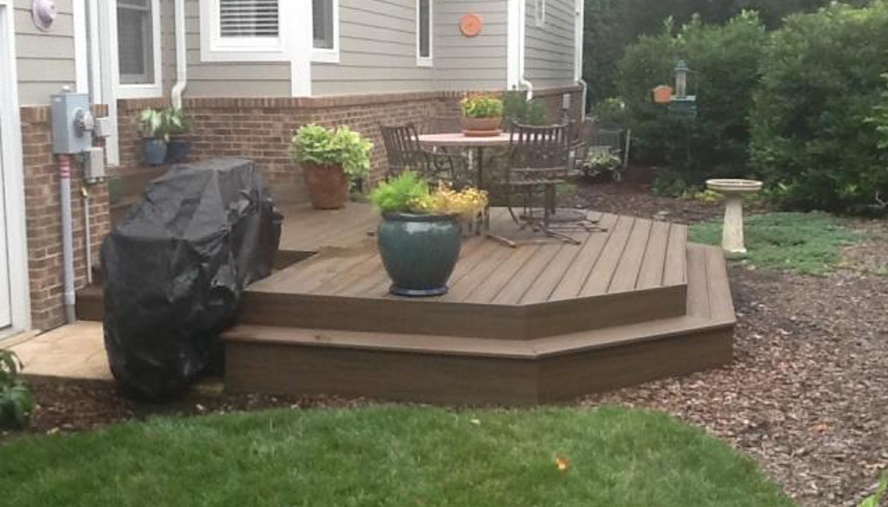 This small back yard is complitmented Spiced Rum deck