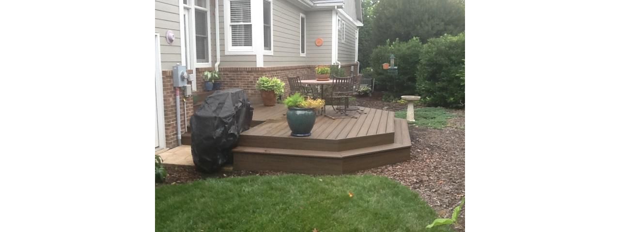 This small back yard is complitmented Spiced Rum deck