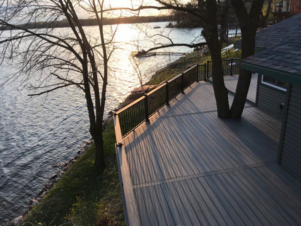 Maple Lake Trex Island Mist Composite decking with Signature rail and LED post cap lights