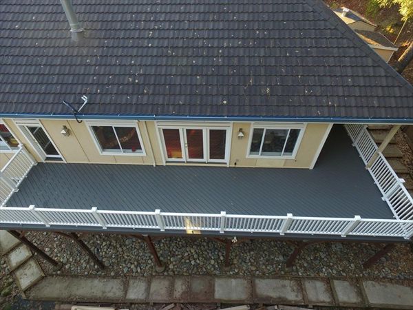 Custom Trex Deck with White Trex Transcend Railing.