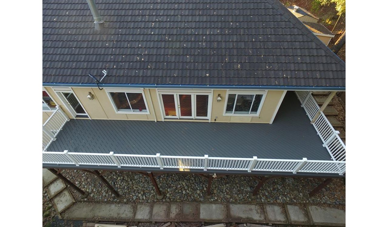 Custom Trex Deck with White Trex Transcend Railing.