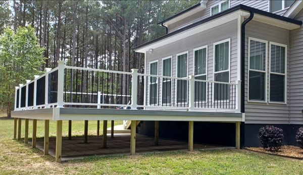 Extended living space on this Trex Enhance Naturals Foggy Wharf deck