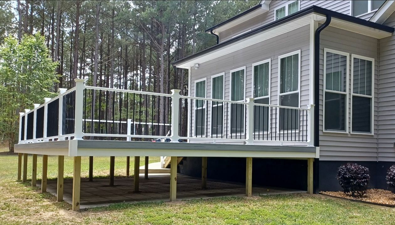 Extended living space on this Trex Enhance Naturals Foggy Wharf deck