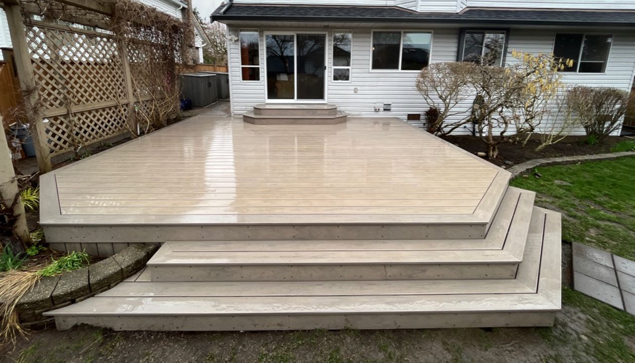 Biscayne field, bordering, risers, fascia, and skirting. A truly exceptional upgrade to the previous space, using the natural lines of the deck spacing as the main standout detail.