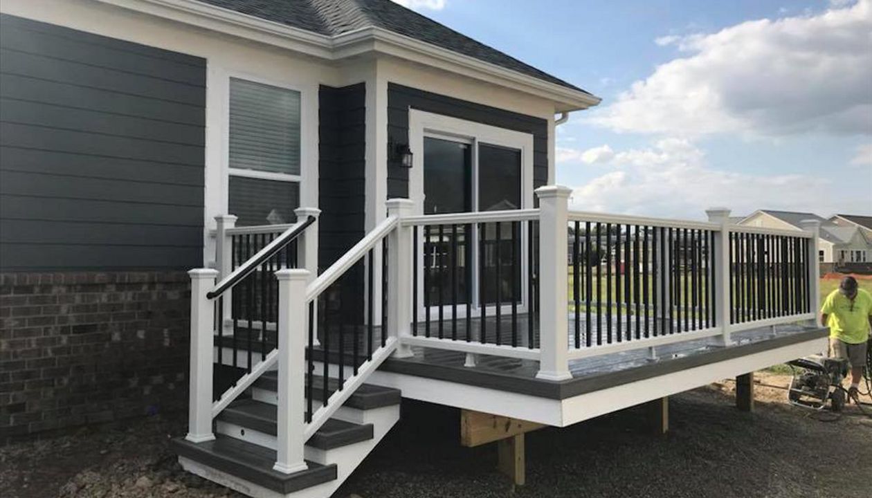 Clam shell decking with Island Mist accents and Transcends rail