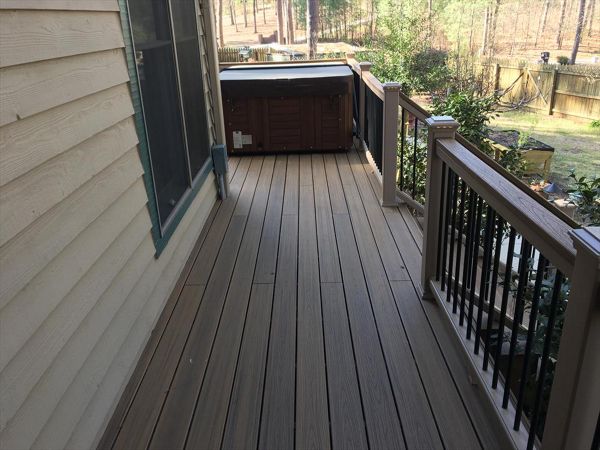 Trex Transcend decking gives a nice splinter free path to this great hot tub area