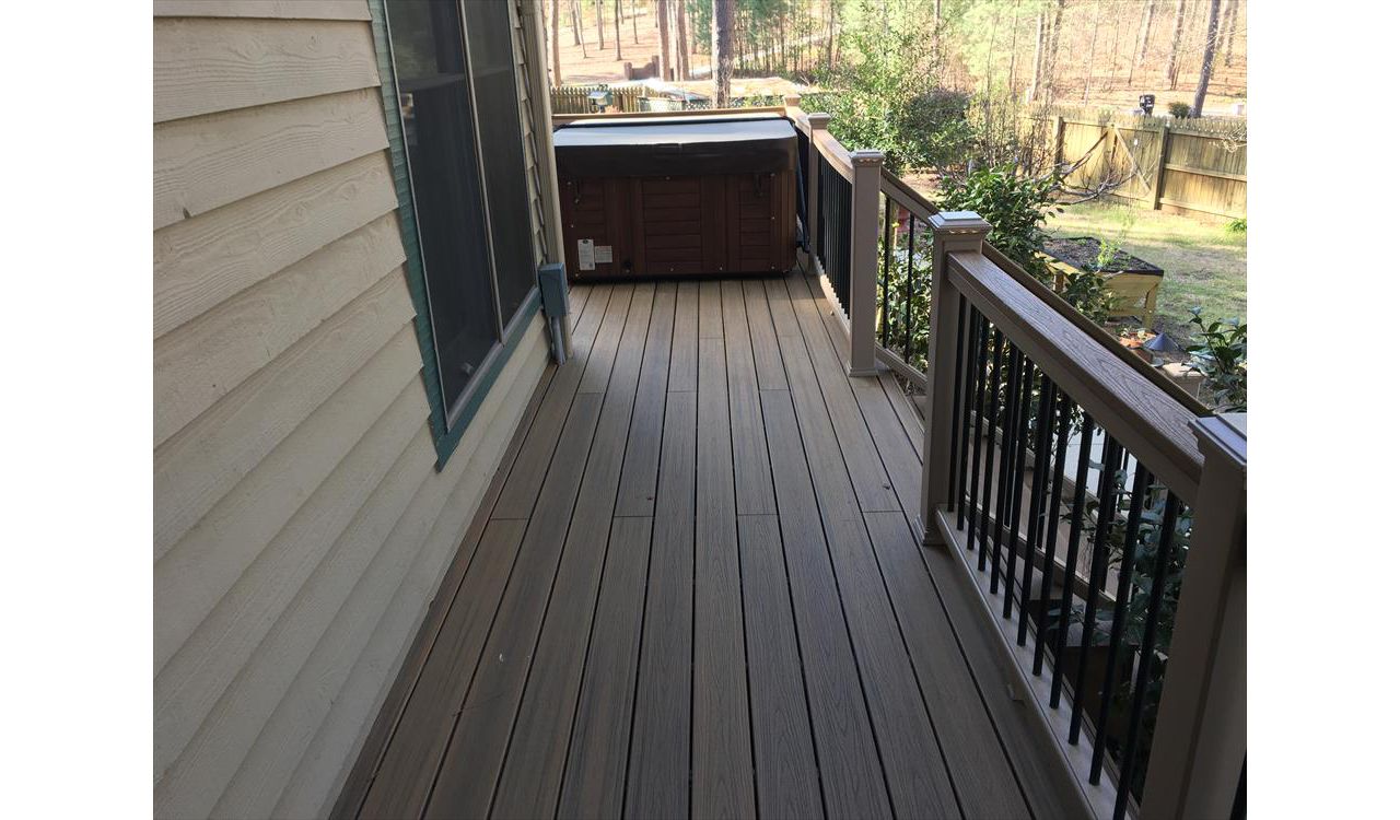 Trex Transcend decking gives a nice splinter free path to this great hot tub area