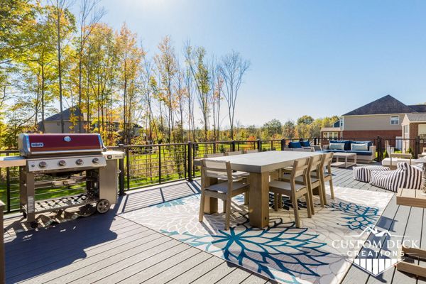 Trex Select Winchester Grey decking with Trex Rod Rail railing in black.