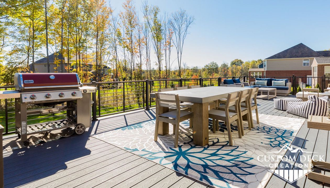 Trex Select Winchester Grey decking with Trex Rod Rail railing in black.