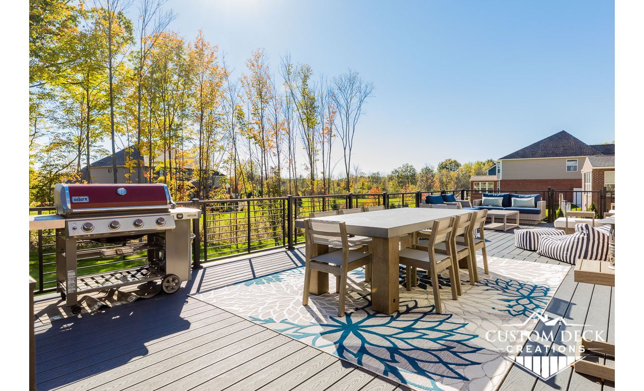 Trex Select Winchester Grey decking with Trex Rod Rail railing in black.