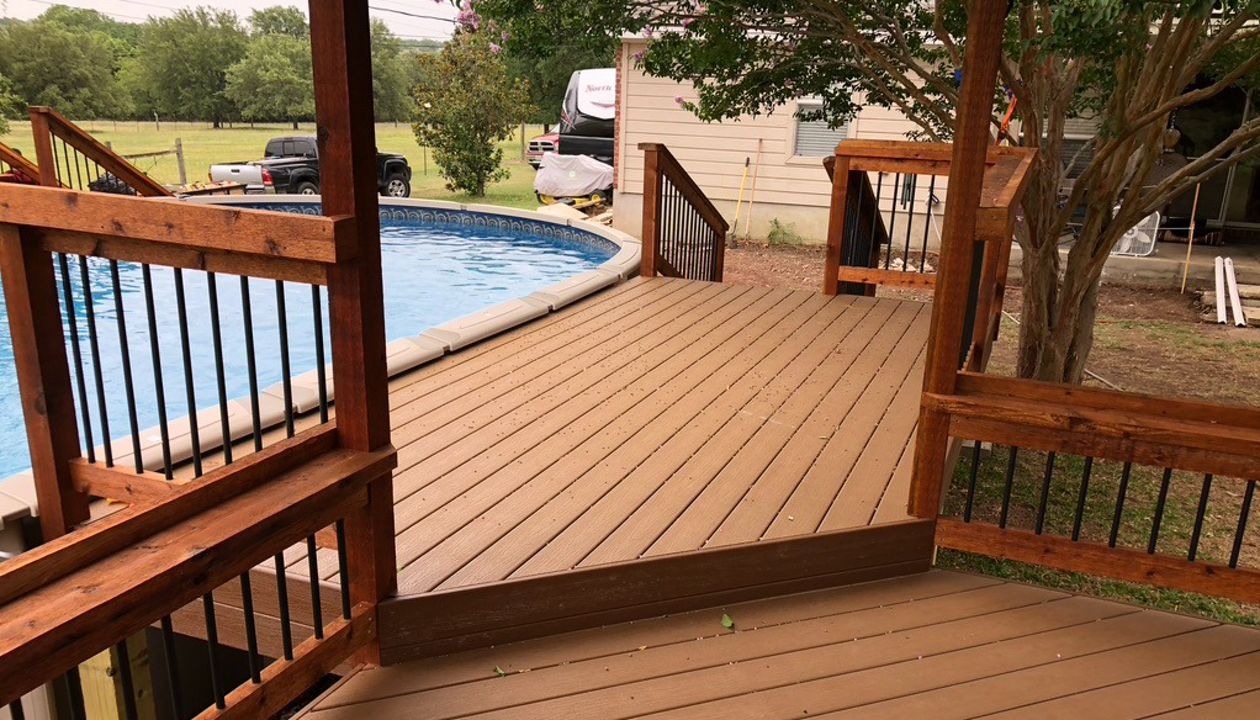 Trex Beach Dune and Custom Cedar Railing for Above Ground Pool